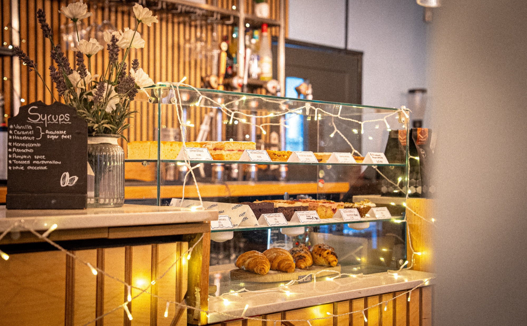 Pastry and cake counter with fairy lights